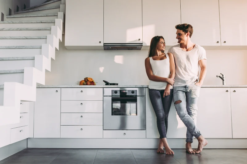 Couple standing in the kitchen